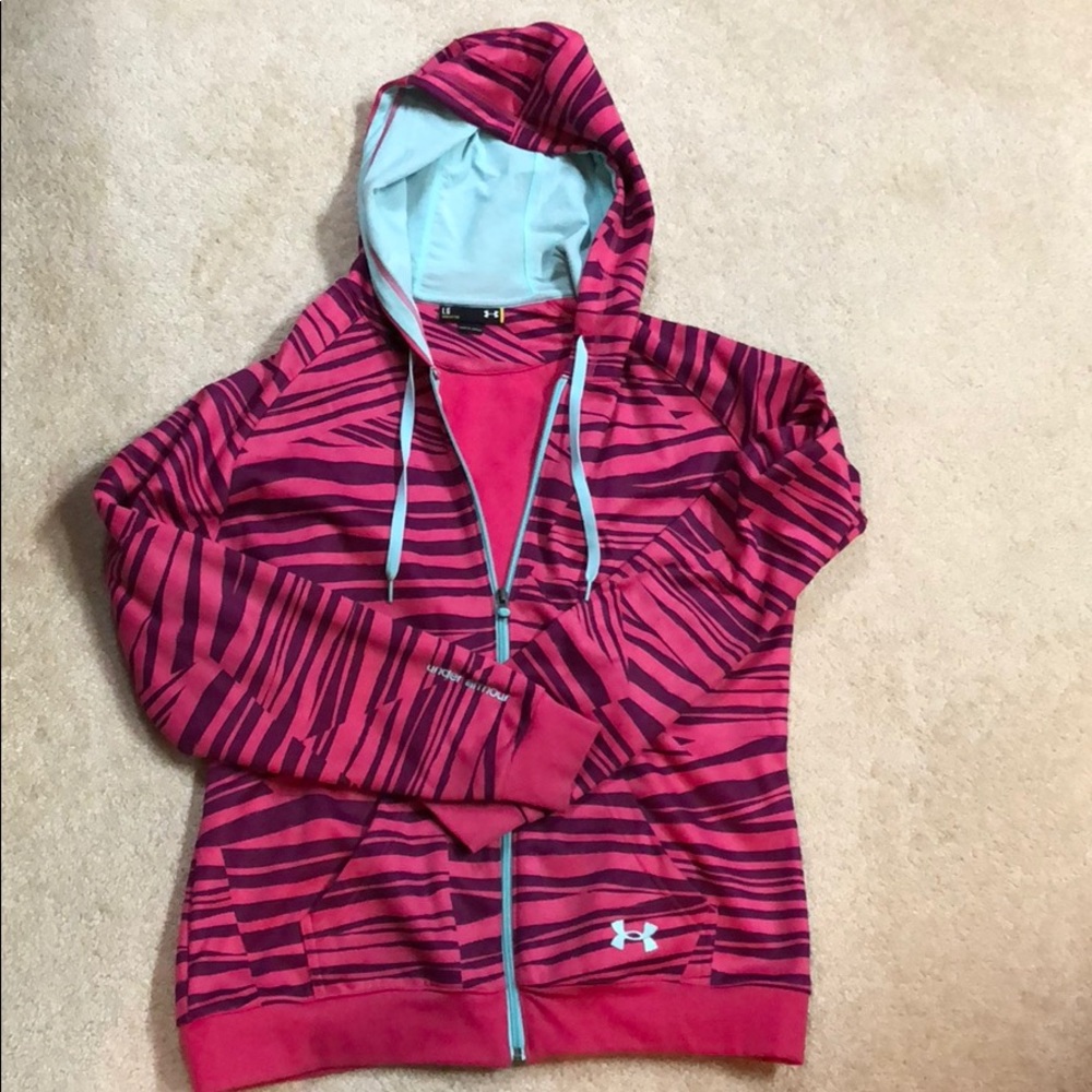 Woman’s Under Armour semi-fitted hooded zip up